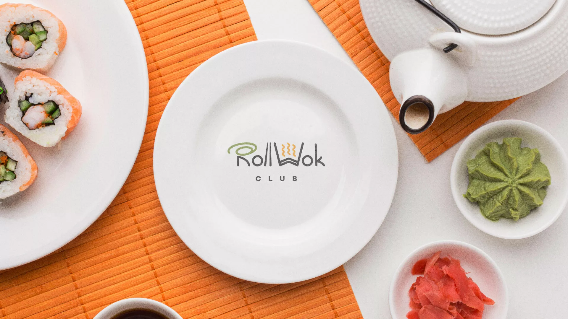Разработка логотипа и фирменного стиля в Междуреченске для суши-бара «Roll Wok Club» Разработка логотипа и фирменного стиля в Междуреченске для суши-бара «Roll Wok Club»
